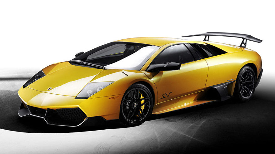 Yellow sports car on a white background